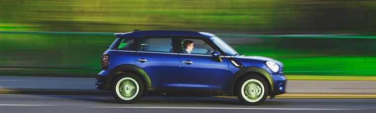 Mini driving on road